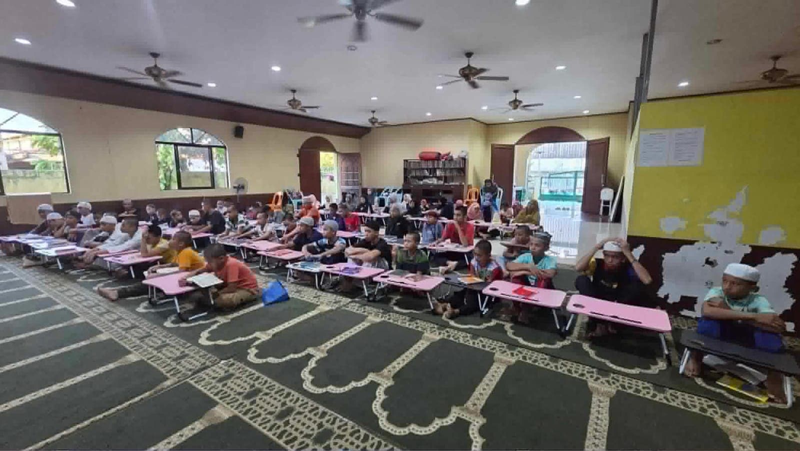 A full classroom of learners using the curriculum at the Olayn Islamic Foundation